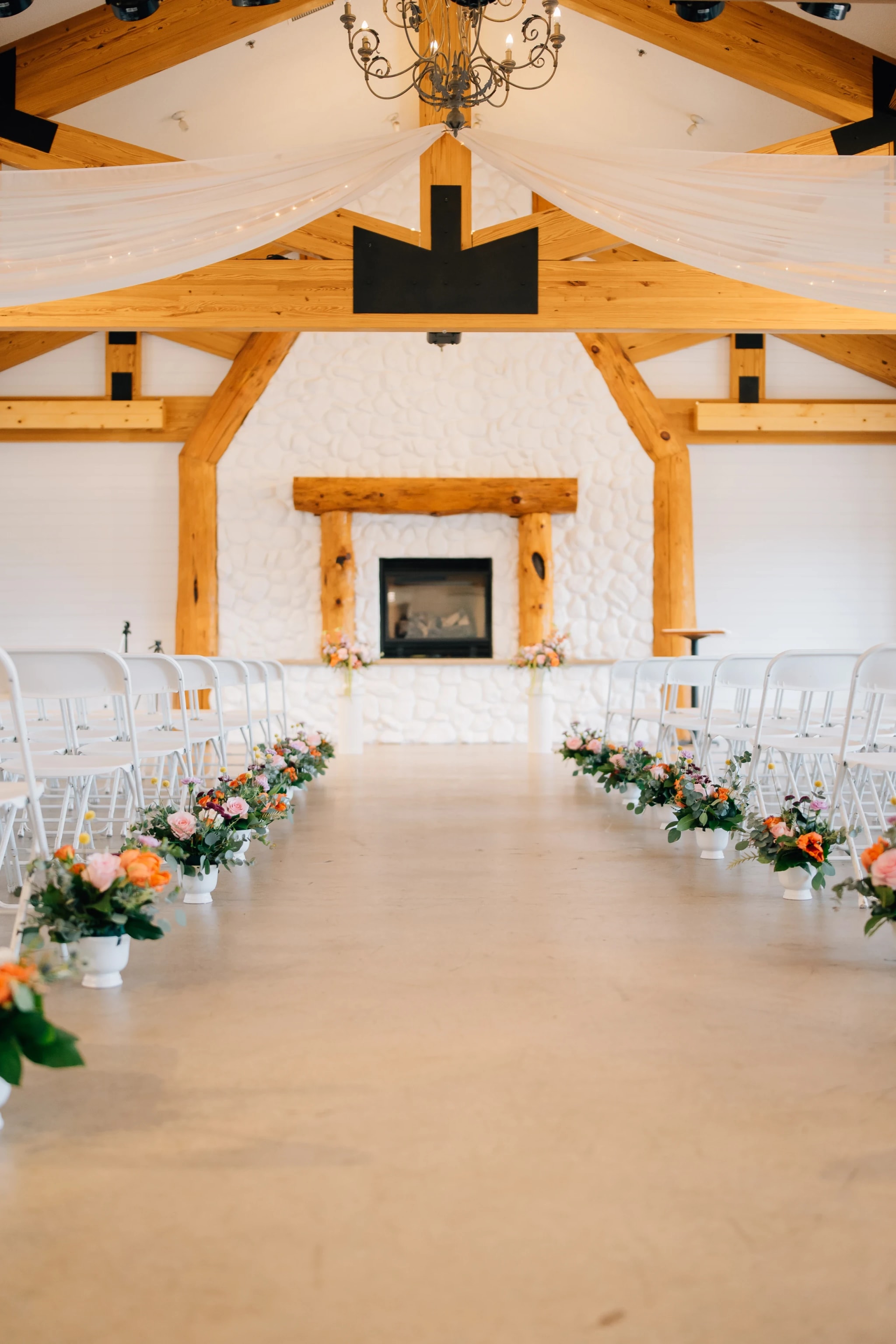 A wedding reception set in the ballroom at The Grands at Mulligans